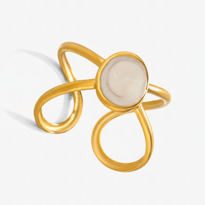 Gold Adjustable Pearl Ring with a central stone on a white background