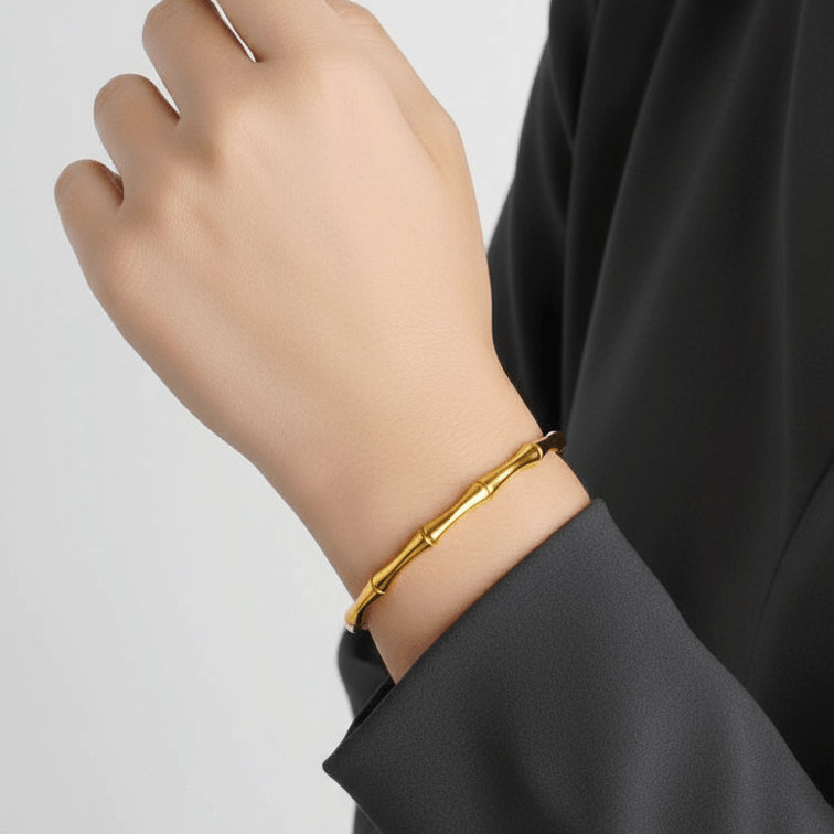 Gold Bamboo Bangle Bracelet on model wrist