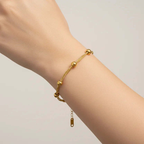 Ceyrah Gold Beaded Multi Chain Bracelet on wrist, minimalist jewellery for women