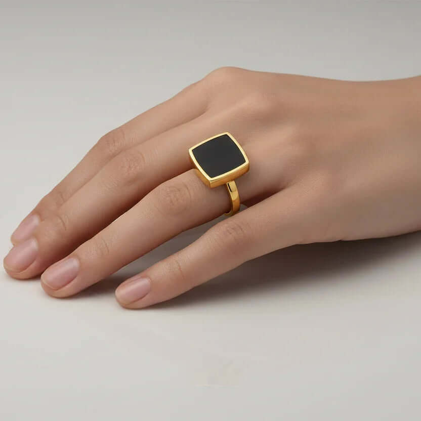Hand Gold Black Square Ring from Ceyrah on a neutral background