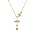Gold Celestial Star Drop Necklace on a white background