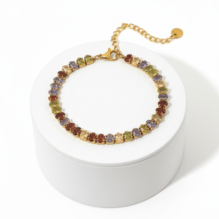 Gold Colour Gemstone Bracelet featuring jewel-tone beads and a polished gold chain on a display box.