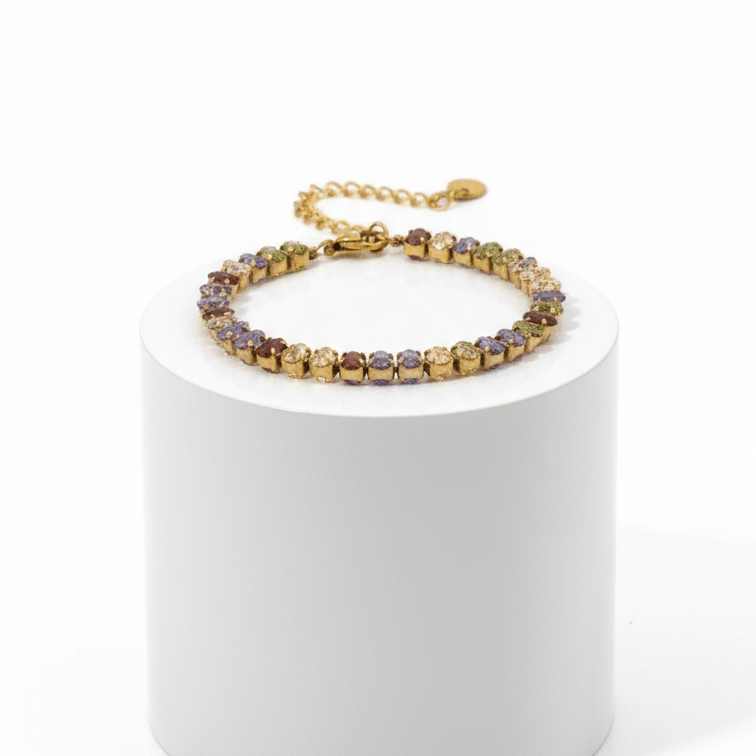 Gold Colour Gemstone Bracelet with jewel-tone beads on a display stand.