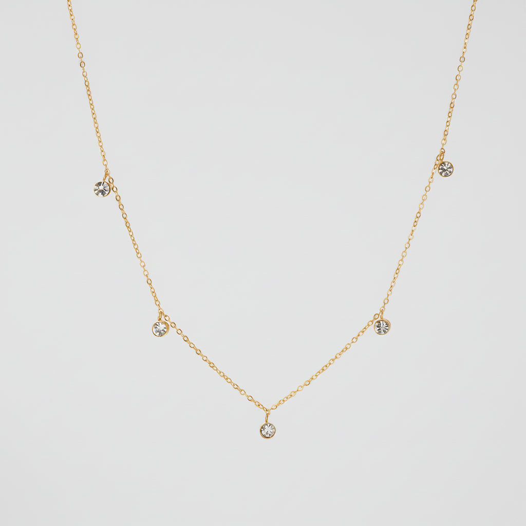 Gold Crystal Station Necklace with five small round clear crystal charms spaced along the chain, shown on a white background with text indicating length 400mm+60mm and weight 5.1g.