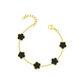 Ceyrah Black Gold Five Clover Bracelet on a light background