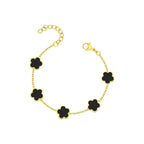 Ceyrah Black Gold Five Clover Bracelet on a light background