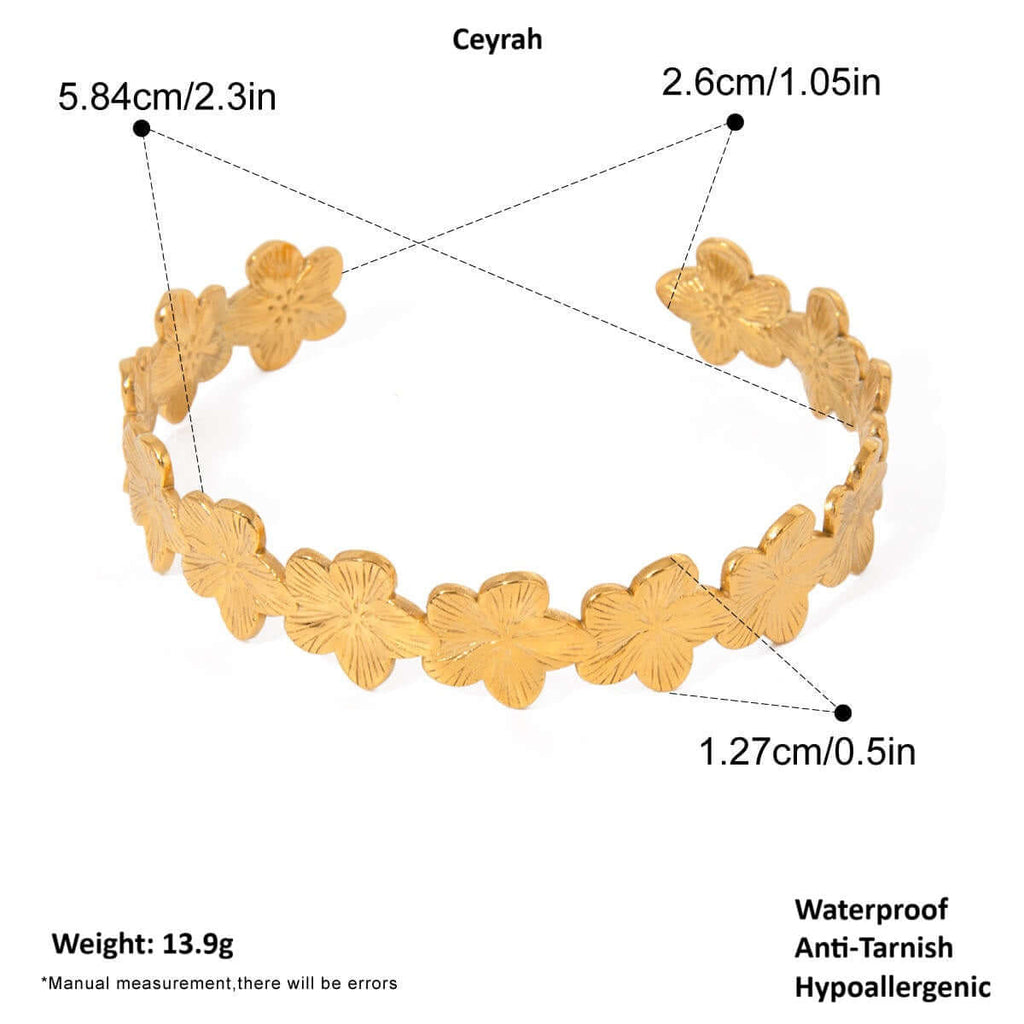Gold Floral Cuff Bracelet with measurements and features on a white background