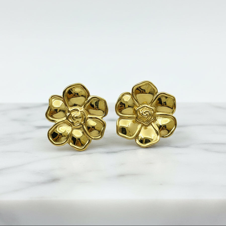 A pair of shiny Gold Flower Stud Earrings