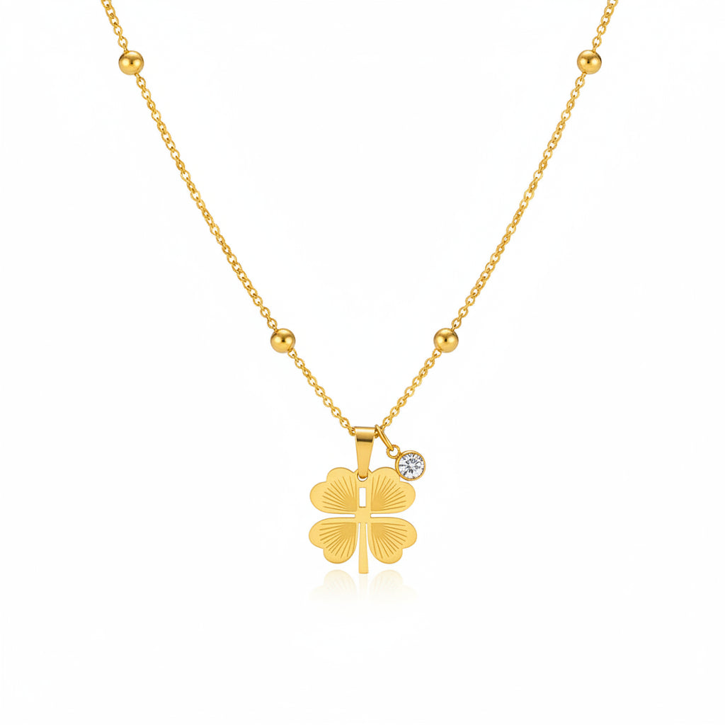 Gold Four‑Leaf Clover Pendant Necklace on a white background