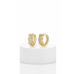 Gold Heart Crystal Cluster Hoop Earrings with heart designs on a white pedestal against a white background