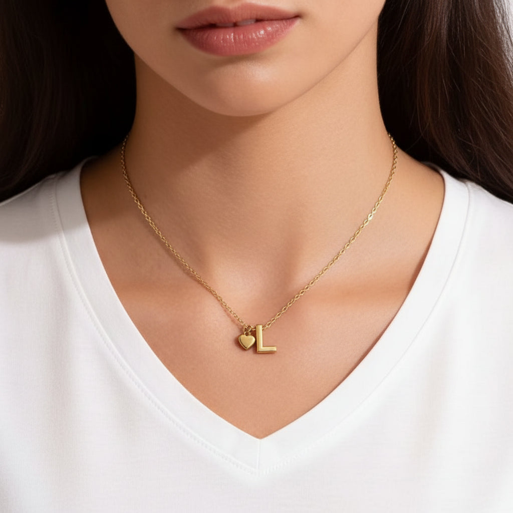 Gold Heart & I Initial Pendant Necklace on a person