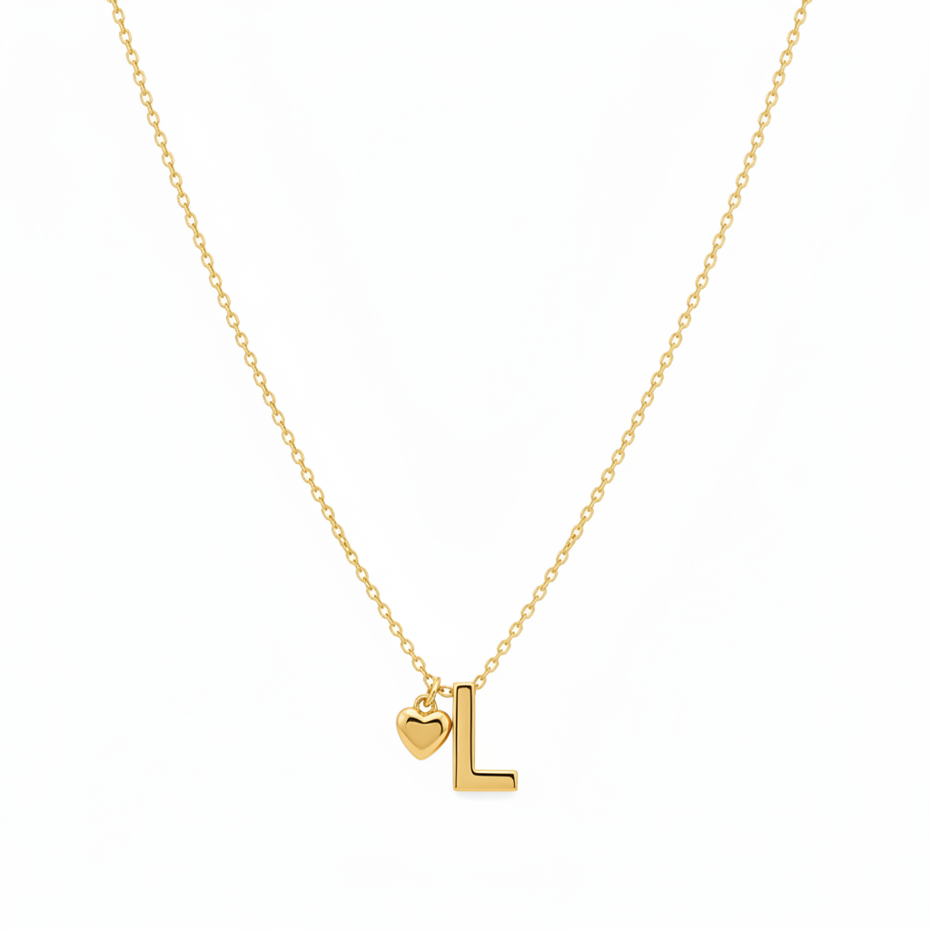 A delicate Gold Heart & I Initial Pendant Necklace, displayed against a solid white background.