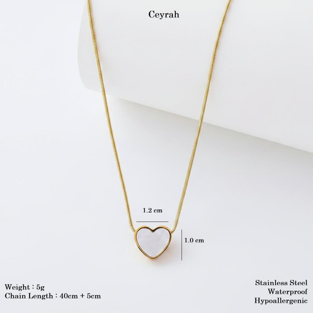 Gold Heart White Inlay Necklace with a white iridescent inlay, shown on a white background with printed dimensions and product details.