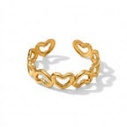Gold Open Heart Adjustable Ring featuring a continuous link design of interlocking hearts, shown on a clean white background with a soft shadow.