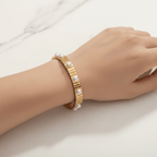 Gold Pearl Accent Bracelet on a wrist against a neutral background