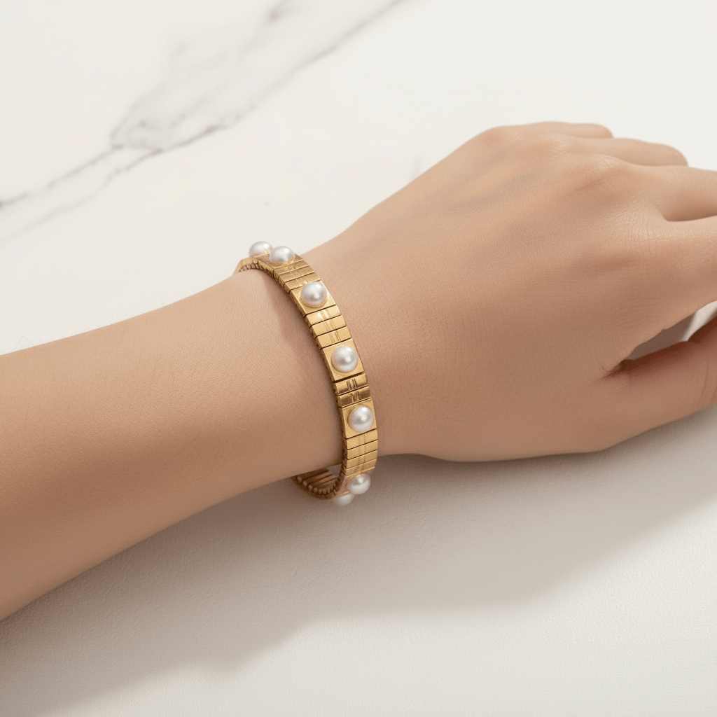 Gold Pearl Accent Bracelet on a wrist against a neutral background