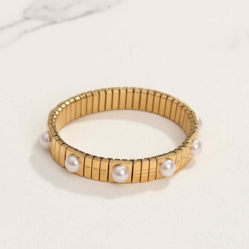 Gold Pearl Accent Bracelet on a white surface