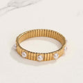 Gold Pearl Accent Bracelet on a white surface