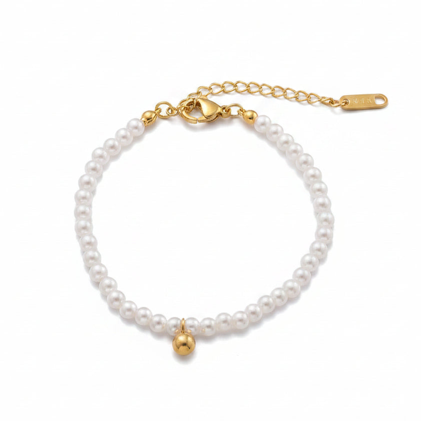 Gold Pearl Bead Bracelet with plain background