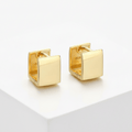 Gold Rectangular Huggie Hoop Earrings on white background