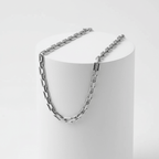 Silver Rectangular Link Chain Necklace on white pedestal 