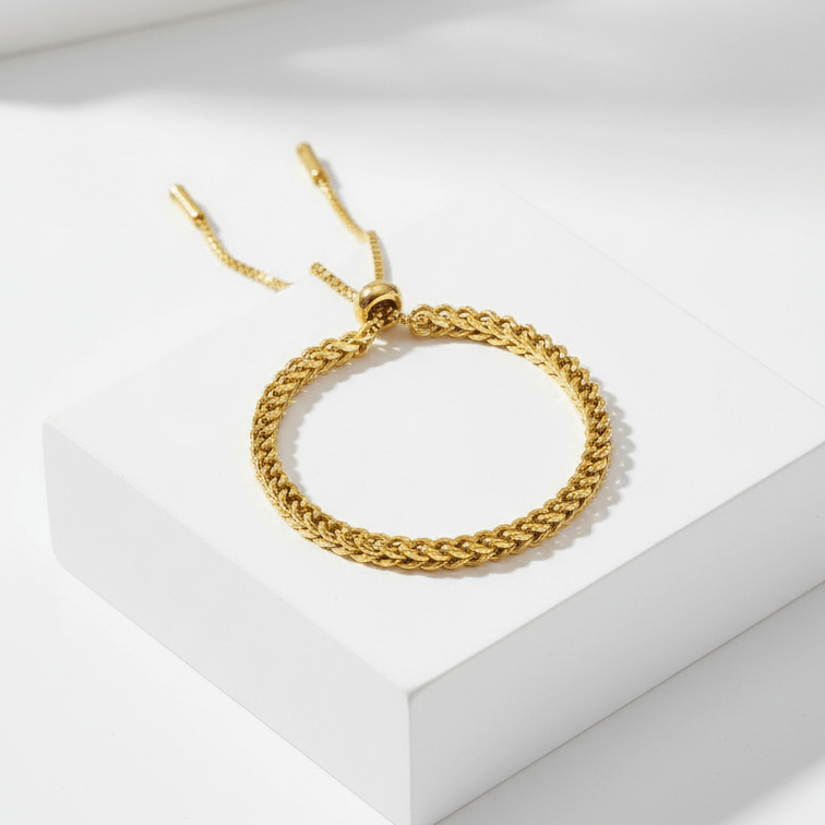 Gold Rope Chain Adjustable Bracelet on a white surface