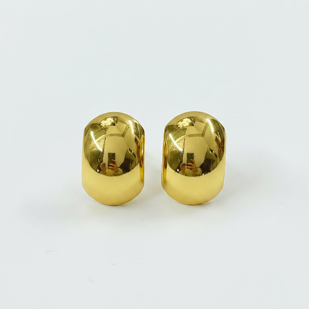Gold Rounded Statement Stud Earrings plain background