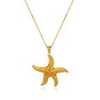 Gold Starfish Pendant Necklace on a chain against a white background