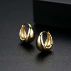 Gold Teardrop Mini Hoop Earrings on black background