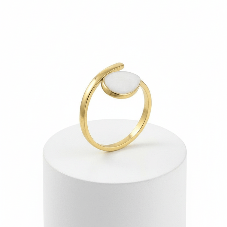 Gold Teardrop Wrap Ring featuring a smooth white teardrop centerpiece on a polished gold-tone frame.