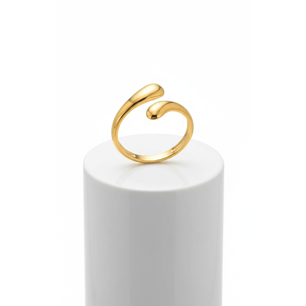 Gold Teardrop Sculptural Ring on pedestal
