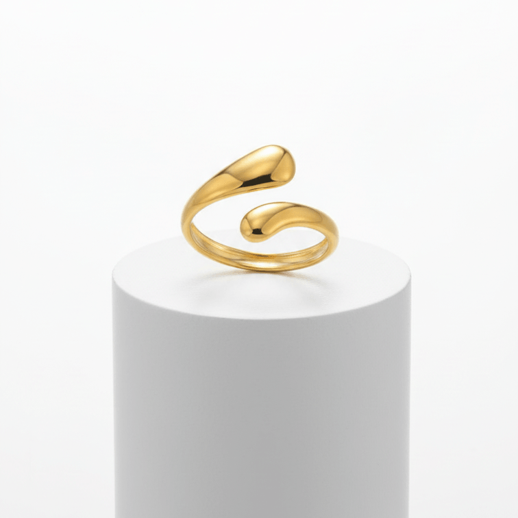 Gold Teardrop Sculptural Ring on pedestal