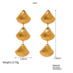 Gold Tiered Seashell Earrings with measurements and product details on a white background