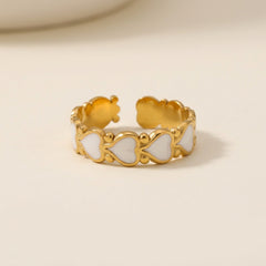 Gold White Heart Adjustable Ring with intricate design on a white background