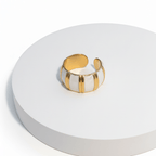 Gold White Inlay Adjustable Ring on a round white platform with a white background
