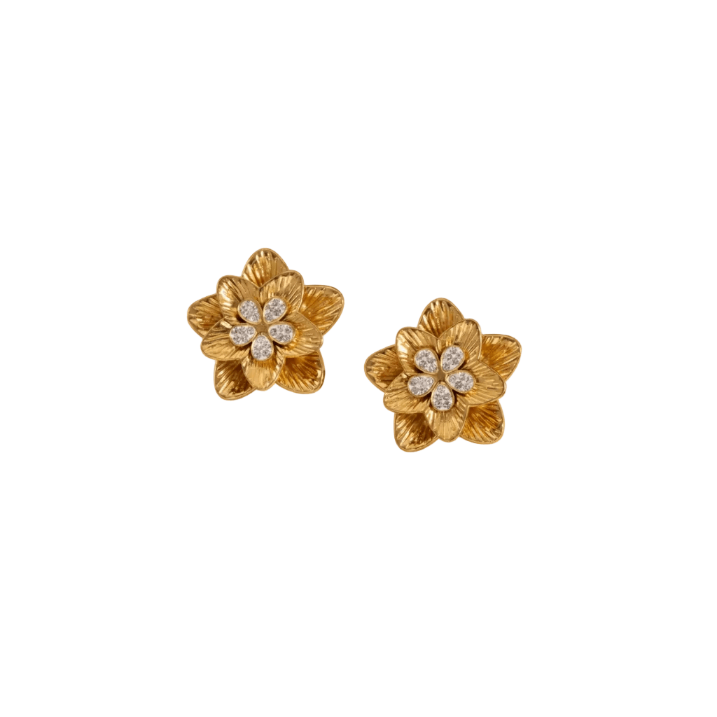 gold floral shaped stud earrings featuring intricately carved petals and luminous white stones for a floral charm.