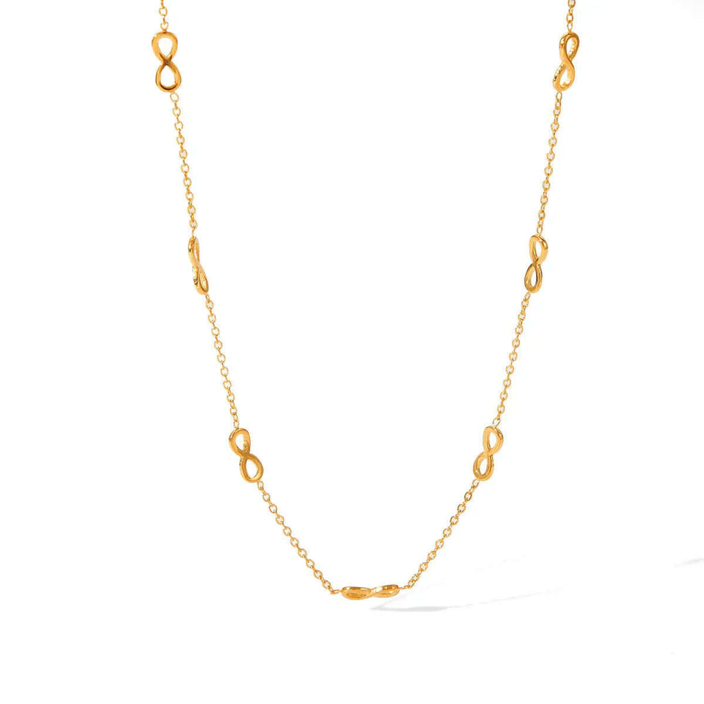 Ceyrah gold infinity link necklace on white background, elegant minimalist jewelry