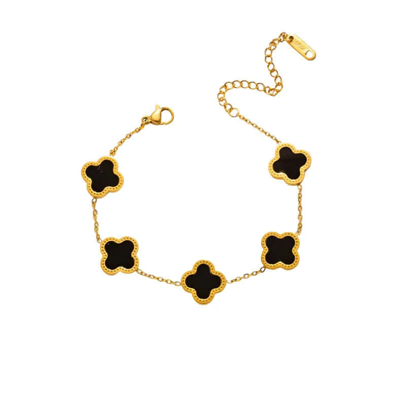 Ceyrah gold chain bracelet with black four-leaf clover charms on white background