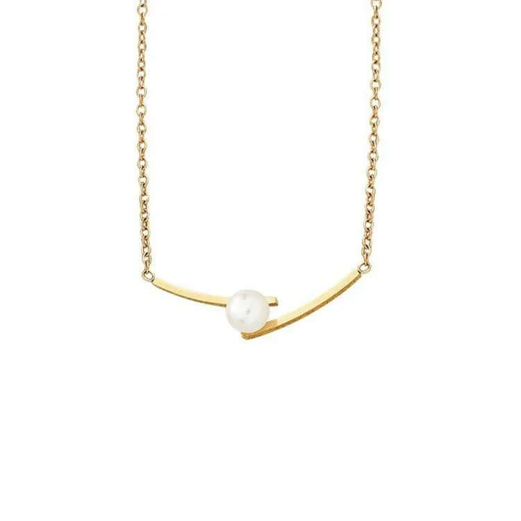 Ceyrah gold necklace with a single white pearl on a delicate chain