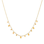 Ceyrah gold teardrop charm necklace on delicate chain, minimalist jewelry