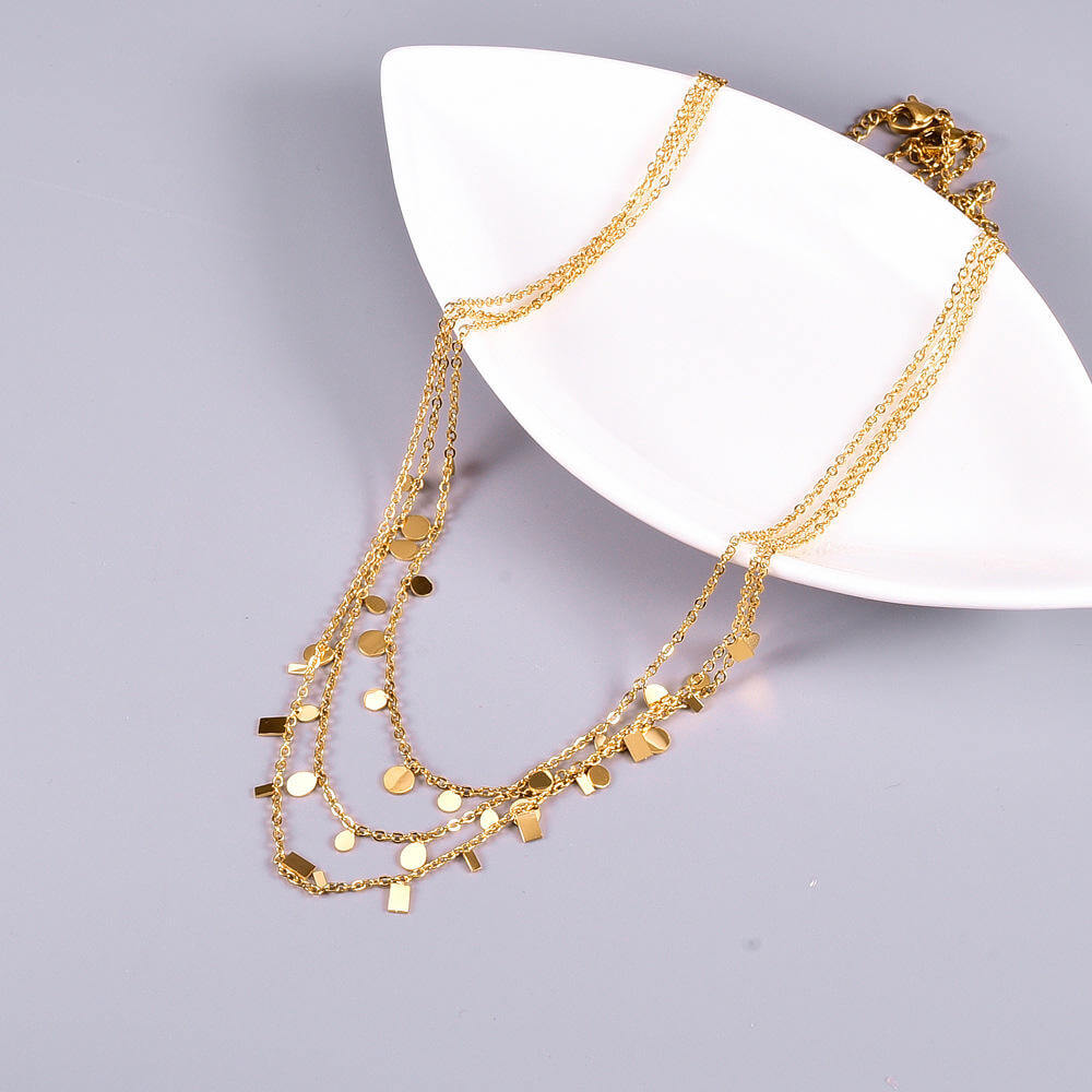 Ceyrah gold coin charm necklace on delicate chain, minimalist jewelry