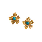 Gold Floral Stud Earrings with Turquoise Centre on a beige and white background