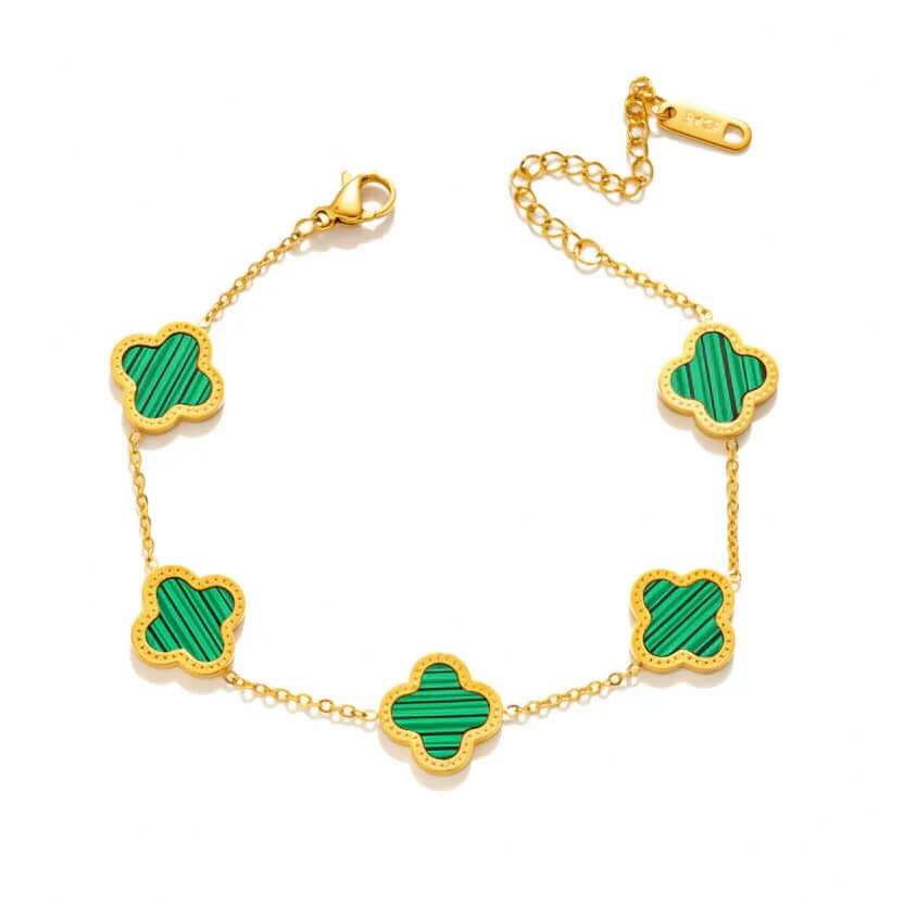 Gold bracelet with green clover-shaped charms on white background, Ceyrah jewelry