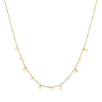 Ceyrah gold necklace with small rectangular charms on delicate chain