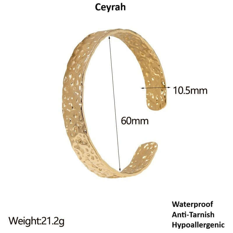 Gold textured bracelet against a white background with measurements