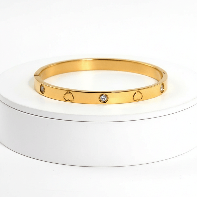 Heart Engraved Bangle Bracelet on platform