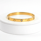 Heart Engraved Bangle Bracelet on platform