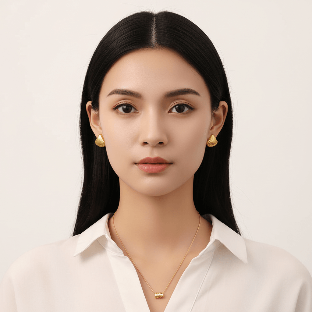 Ceyrah - Gold Shell Ribbed Stud Earrings worn by women