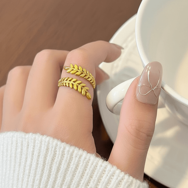 Aurelia Leaf Adjustable Gold Ring on model hand