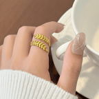 Aurelia Leaf Adjustable Gold Ring on model hand